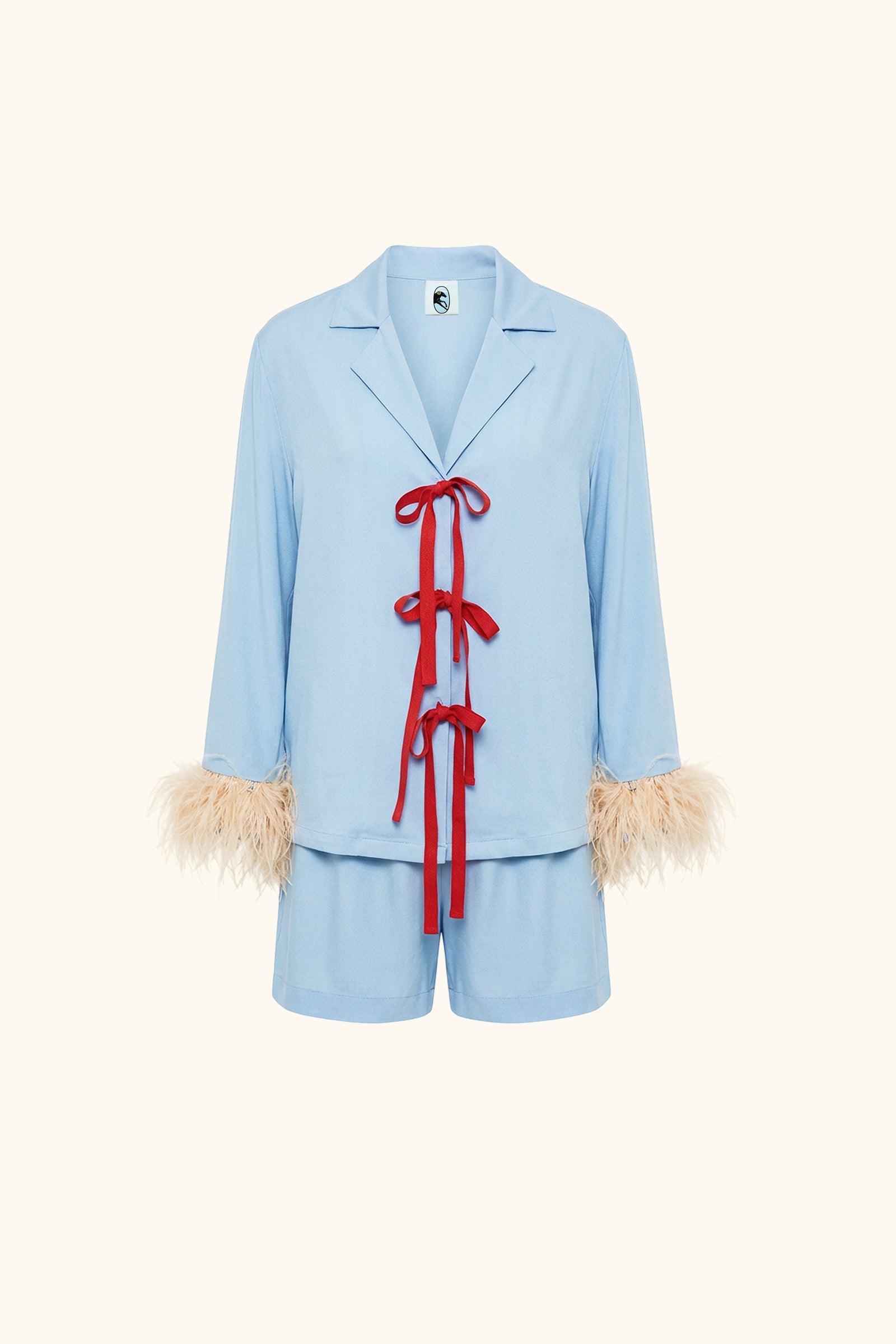 The Bow Set with shorts in Blue with Detachable Feathers in Beige