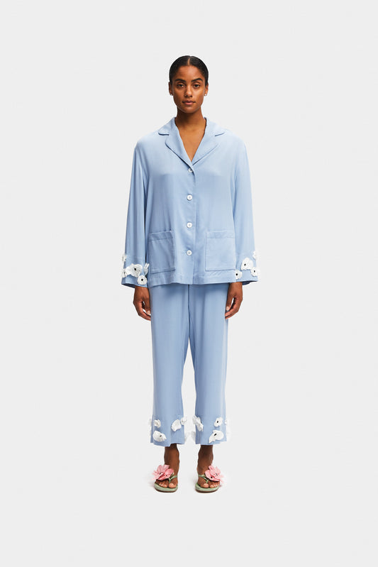https://the-sleeper.com/cdn/shop/files/SLEEPER_SS2403PCP_The_Bloom_Party_Pajama_Set_with_Pants_in_Blue_SLEEPER_SS2440PM_Poppies_Silk_Kitten_Heel_Mules_in_Mint_and_Pink_a6573930-297b-46c3-b169-07b177d667d6.jpg?v=1706708634&width=533