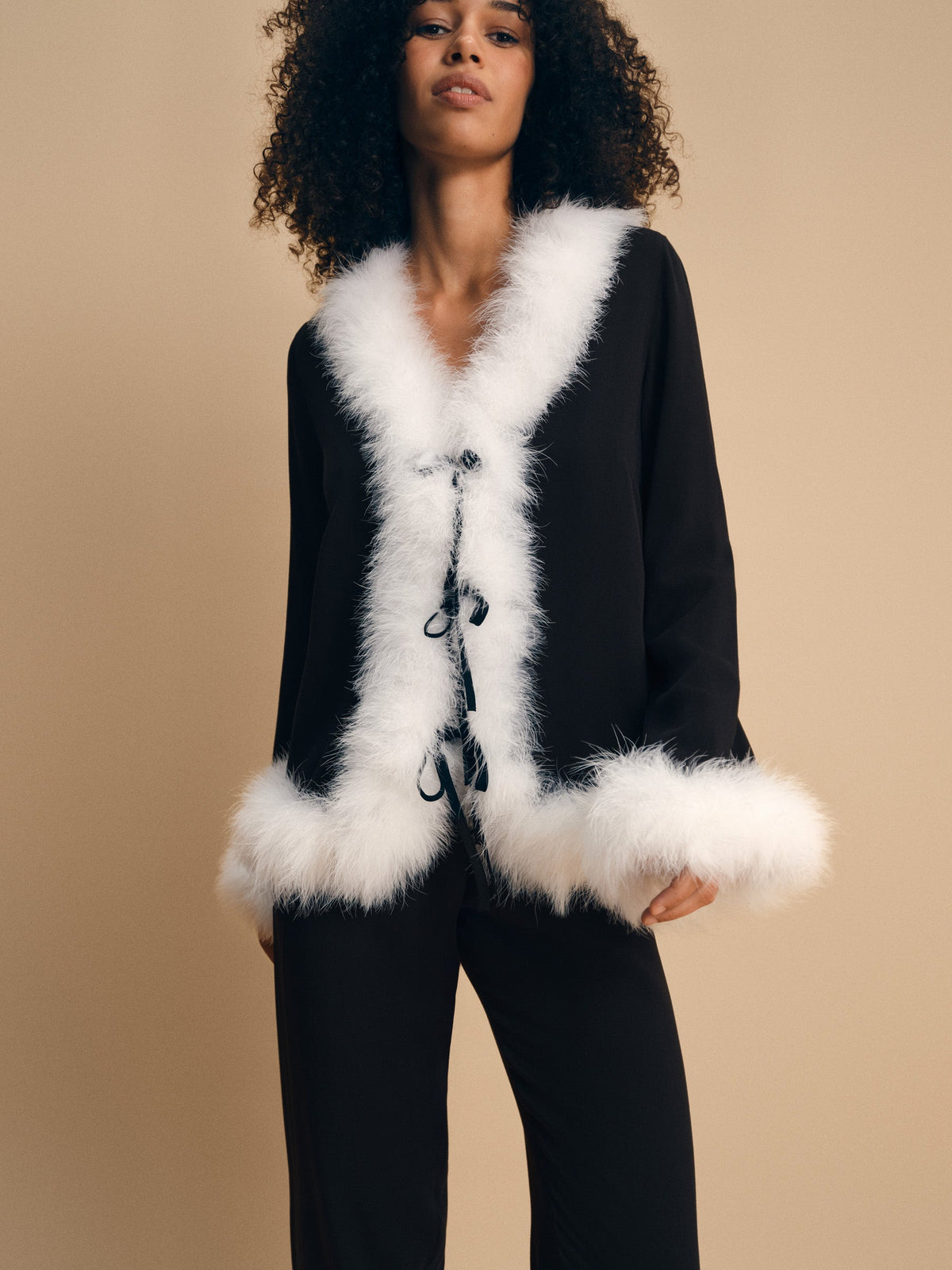 Venus in Love in Black — lookbook detail of blouse and matching pants with feathers